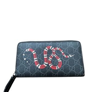 Gucci Kingsnake GG Supreme zip-around wallet in black canvas & leather trim